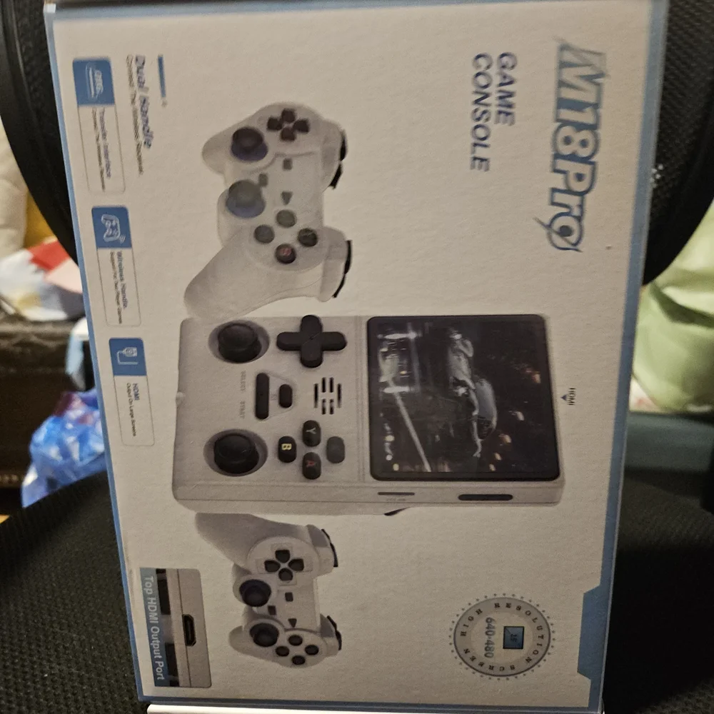 White Handheld Gaming Console with Dual Controllers